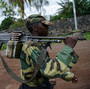 A M23 rebel in the streets of Goma.