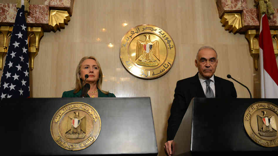 Egyptian Foreign Minister Mohammed Kamel Amr and U.S. Secretary of State Hillary Rodham Clinton announced the "hold fire" agreement in Cairo.