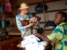 Angel Salvatory, 17, buys cloth at a market in Kabanga village in Tanzania. Albinos living in a nearby protection center are allowed to go to the local market as long as they travel in a group for their own safety. Angel Salvatory, 17, buys cloth at a market in Kabanga village in Tanzania. Albinos living in a nearby protection center are allowed to go to the local market as long as they travel in a group for their own safety.