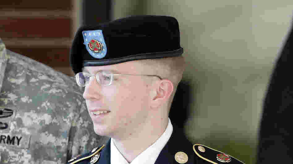 Army Pfc. Bradley Manning is escorted out of a courthouse in Fort Meade, Md., after a pretrial hearing in June. Manning is charged with aiding the enemy by giving hundreds of thousands of classified diplomatic cables and war logs to the secret-sharing website WikiLeaks.
