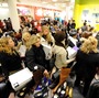 People waited in line to make purchases at a Macy's department store in New York during last year's "Black Friday" shopping weekend.