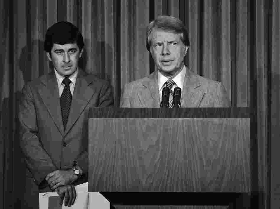 President Carter and health adviser Peter Bourne talk to reporters at the White House  about Carter's drug abuse message to Congress in 1977. Among other things, he called for the elimination of all federal criminal penalties for the possession of up to 1 ounce of marijuana.