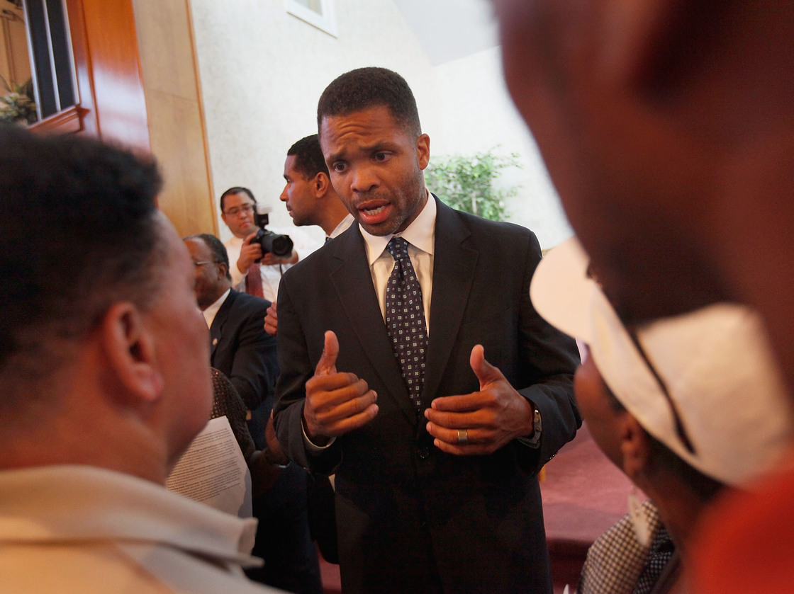 Rep. Jesse Jackson Jr. speaks to constituents in Chicago in 2009. Jackson resigned from Congress on Wednesday, following a hospitalization and an investigation into misuse of campaign funds.