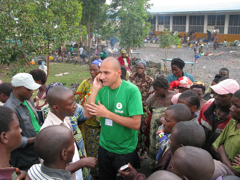 Tariq Riebl, Oxfam humanitarian coordinator in Goma, Democratic Republic of Congo, meets refugees at the Don Bosco Catholic School, where thousands of displaced persons are setting up camp.