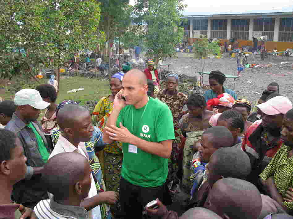 Tariq Riebl, Oxfam humanitarian coordinator in Goma, Democratic Republic of Congo, meets refugees at the Don Bosco Catholic School, where thousands of displaced persons are setting up camp.