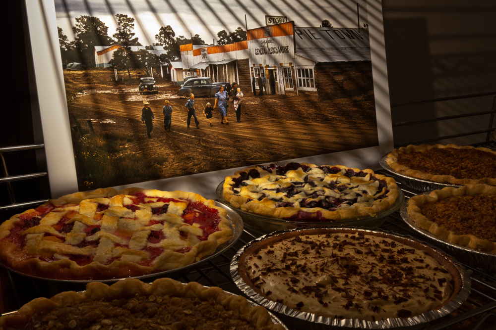 Pies cooling on pie rack with Russell Lee's Main Street, recaptured