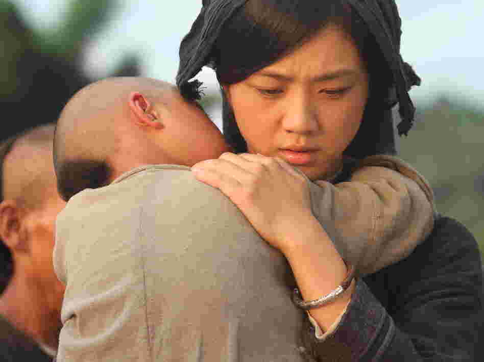 Ayu (Tang Wei) starts her life over with Liu Jinxi after being abandoned by her first husband. Ayu (Tang Wei) starts her life over with Liu Jinxi after being abandoned by her first husband.