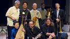 Burning Bridge personnel, left to right: Jason Kao Hwang (violin), Wang Guowei (erhu), Sun Li (pipa), Ken Filiano (string bass), Andrew Drury (drum set), Joseph Daley (tuba), Steve Swell (trombone), Taylor Ho Bynum (cornet/flugelhorn). Burning Bridge personnel, left to right: Jason Kao Hwang (violin), Wang Guowei (erhu), Sun Li (pipa), Ken Filiano (string bass), Andrew Drury (drum set), Joseph Daley (tuba), Steve Swell (trombone), Taylor Ho Bynum (cornet/flugelhorn).