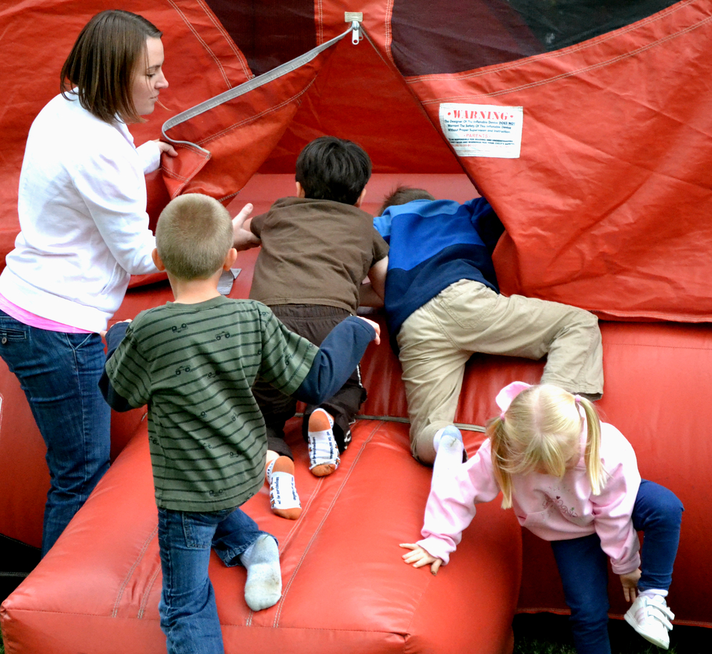 First the kids pile in, then the bouncing begins.