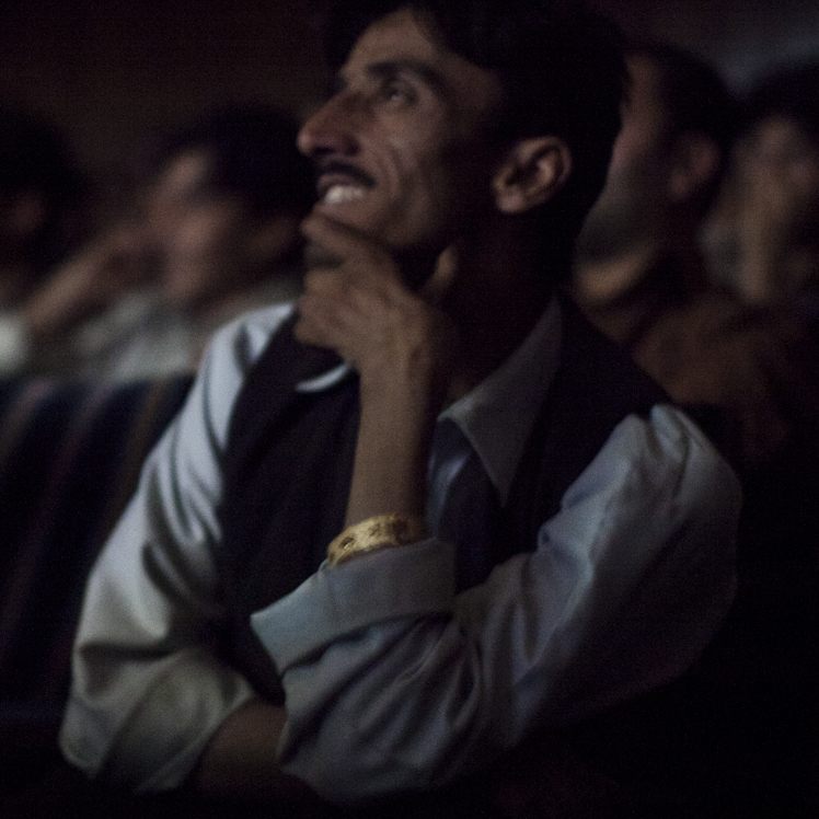 The audience at Pamir Cinema in Kabul watches a Pakistani film.