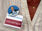 A campaign volunteer wears a button as President Obama speaks at a campaign event in Maumee, Ohio. Now that the election is over, the Obama team is trying to keep supporters engaged in the president's second term. A campaign volunteer wears a button as President Obama speaks at a campaign event in Maumee, Ohio. Now that the election is over, the Obama team is trying to keep supporters engaged in the president's second term.