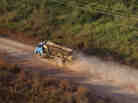 A truck carrying hardwood timber drives along a rural road leading to Paragominas, Brazil, on Sept. 23, 2011. The city has become a pioneering "Green City," a model of sustainability with a new economic approach that has seen illegal deforestation virtually halted.