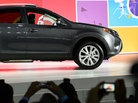 Toyota unveils its new RAV4 crossover SUV to the media Wednesday before the L.A. Auto Show opens to the public. Toyota unveils its new RAV4 crossover SUV to the media Wednesday before the L.A. Auto Show opens to the public.