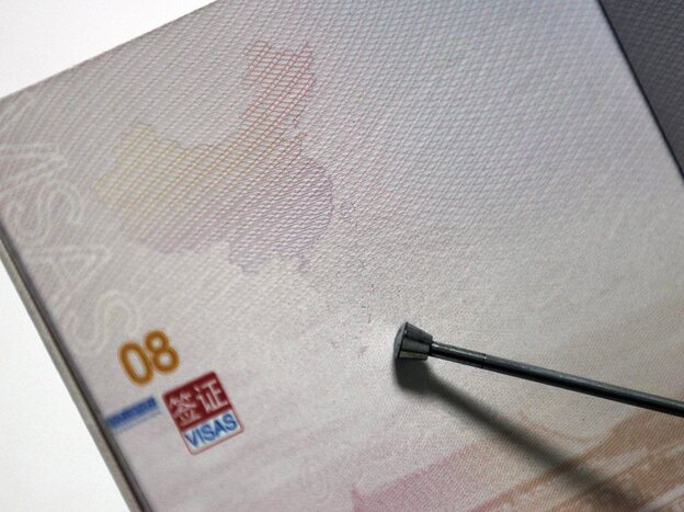 A map in China's new passports shows disputed islands and territorial waters as belonging to China, which has angered several of its neighbors.