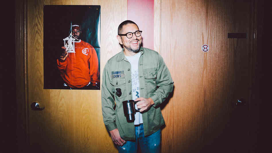Spencer Manio in front of his office (his door is the one with the Ghostface poster) at PlayNetwork.