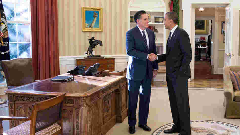 President Obama and former Republican presidential nominee Mitt Romney shake hands in the Oval Office after their lunch Thursday at the White House.