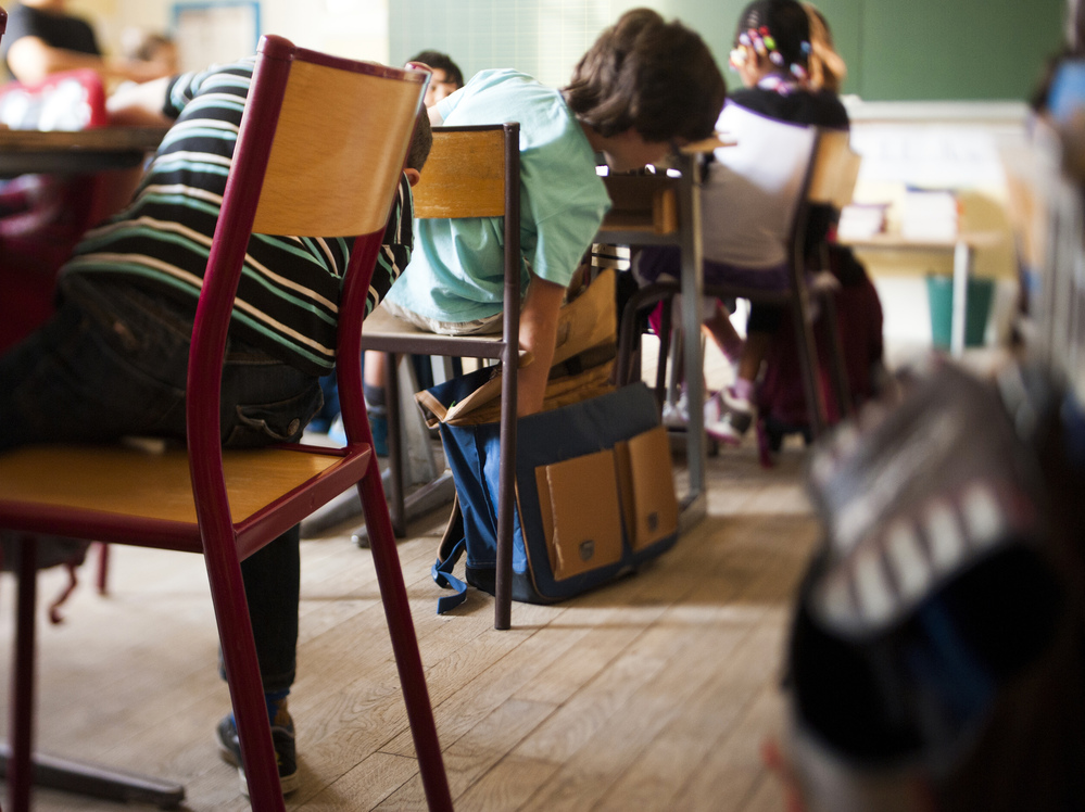 President Francois Hollande argues that homework puts poor children at a disadvantage, but others argue the extra work is needed to help those students succeed. President Francois Hollande argues that homework puts poor children at a disadvantage, but others argue the extra work is needed to help those students succeed.