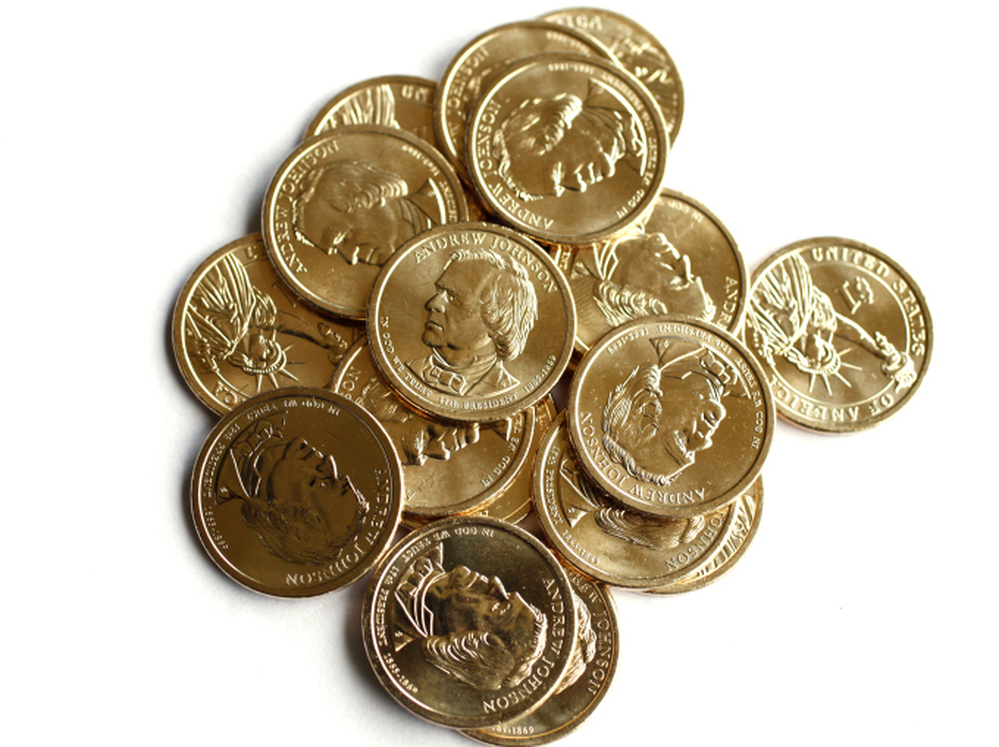 Dollar coins featuring Andrew Johnson, the 17th president of the United States.