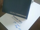 The signed card that donors will get from George Zimmerman. The signed card that donors will get from George Zimmerman.