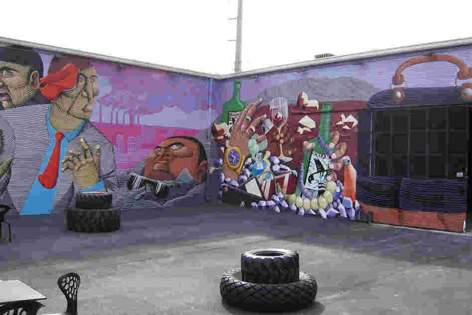 The second wall of Nunca's mural references Miami's material culture.