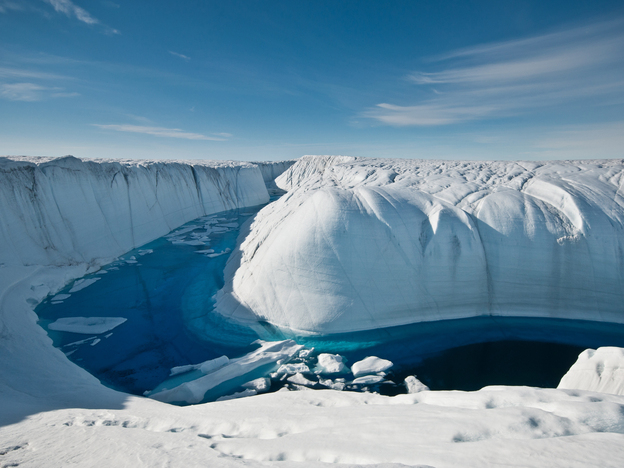 For several summers this deeply incised melt channel transported overflow from a large melt lake to a moulin, a conduit that drains the water through many hundreds of feet to the ice sheet's bed.