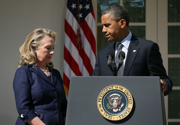 President Obama responds to the attack at the U.S. Consulate in Benghazi as Secretary of State Hillary Clinton looks on in the Rose Garden of the White House on Sept. 12.