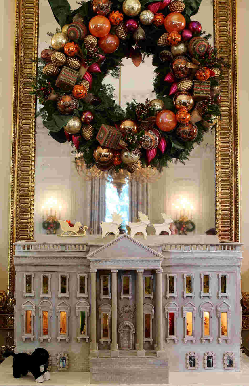 A nearly 300-pound White House gingerbread house sits in the State Dining Room.