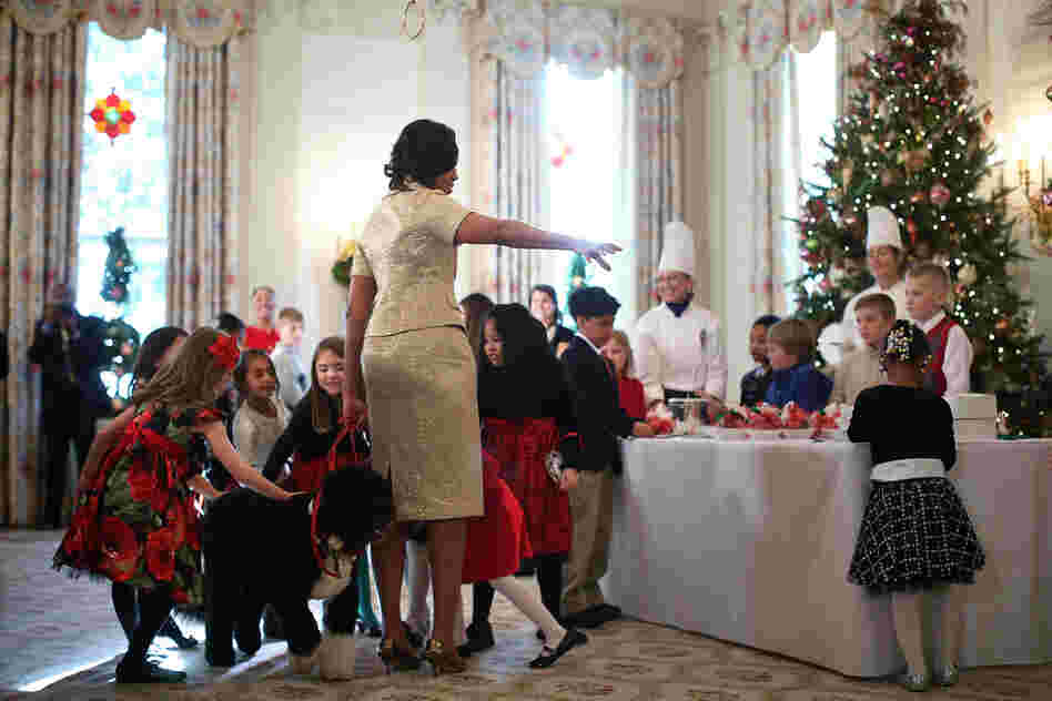 First lady Michelle Obama welcomed military families to the event. The guests' children got to pet the first family's dog, Bo.