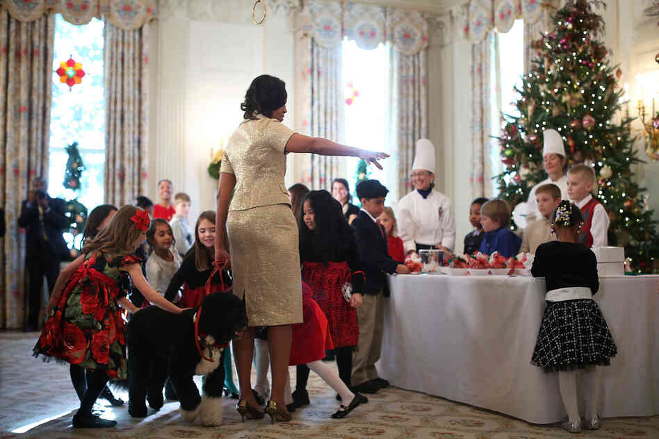 First lady Michelle Obama welcomed military families to the event. The guests' children got to pet the first family's dog, Bo.