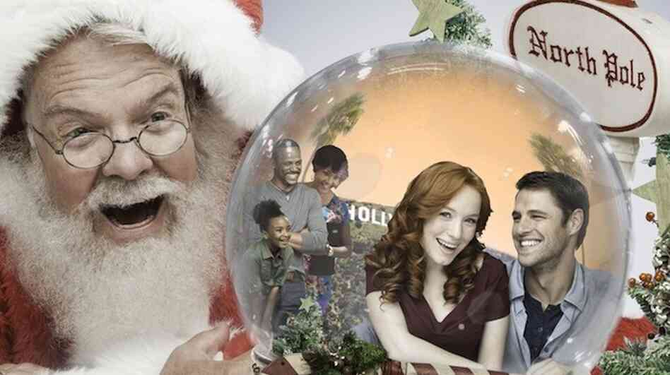 Why yes, this is a promotional image for a real holiday Hallmark movie called Annie Claus Is Comin' To Town. That's Annie Claus, Santa's daughter, inside the snow globe being stared at by her father.