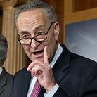 Sen. Charles Schumer, D-N.Y. (right), shown at a news conference Thursday on Capitol Hill with Senate Majority Leader Harry Reid, is arguing for raising taxes on the wealthy as part of a deal to avoid the fiscal cliff.