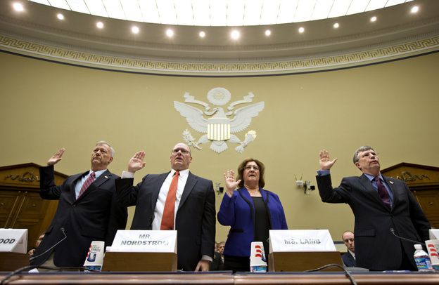 Witnesses are sworn in on Capitol Hill on Oct. 10, before testifying at a House Oversight and Government Reform Committee hearing on the attack on the U.S. Consulate in Benghazi, Libya.