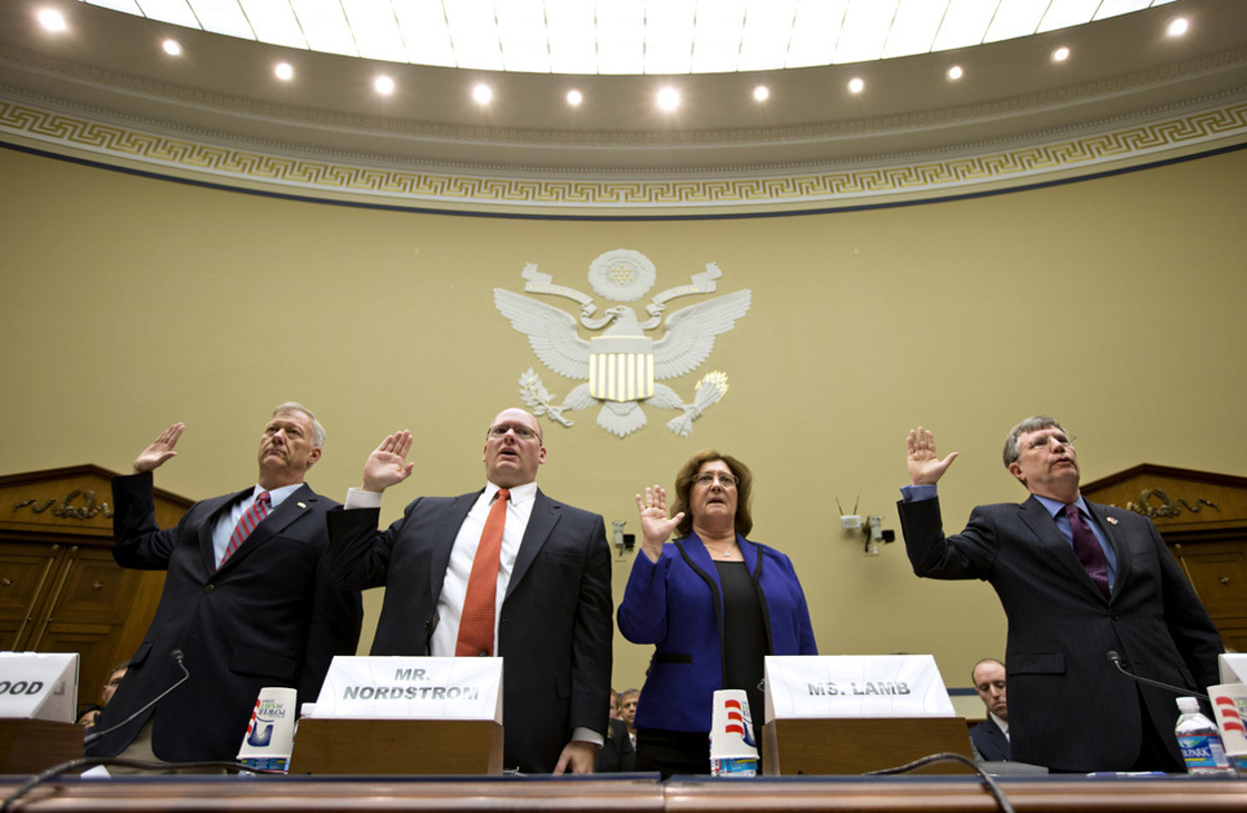 Witnesses are sworn in on Capitol Hill on Oct. 10, before testifying at a House Oversight and Government Reform Committee hearing on the attack on the U.S. Consulate in Benghazi, Libya.