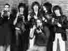 Photographer Ken Regan with the Rolling Stones, 1977