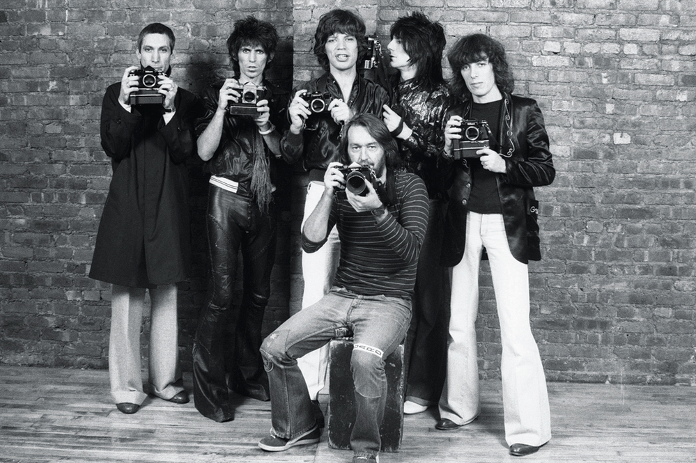 Photographer Ken Regan with the Rolling Stones, 1977