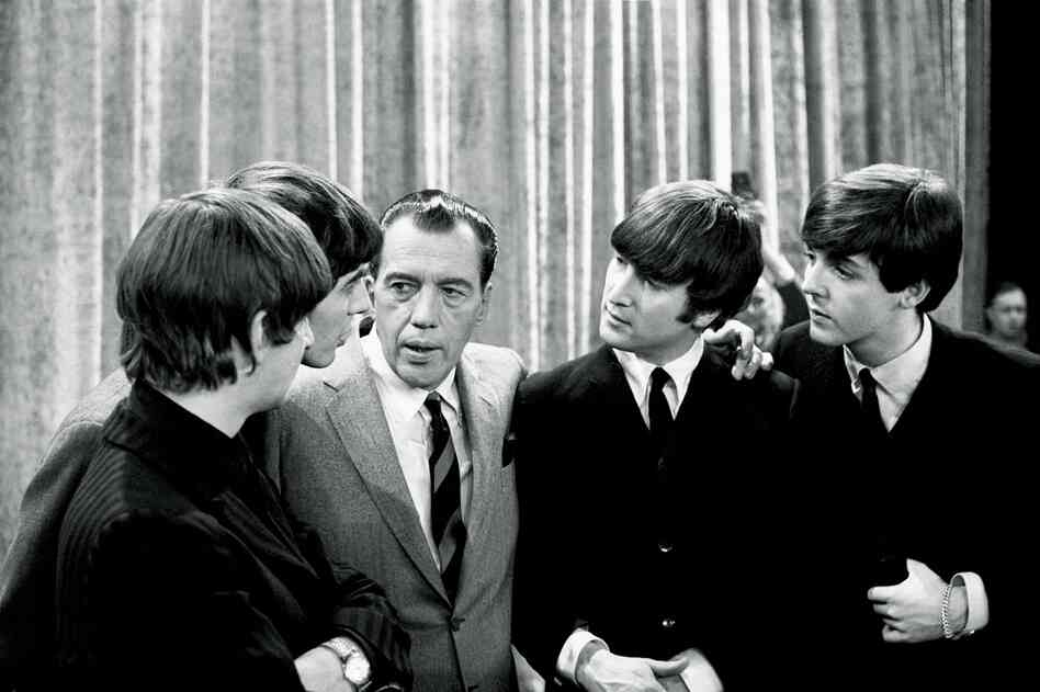 The Beatles with Ed Sullivan, 1964. "The audience in the 703-seat theater shrieked nonstop. This was at the deafening dawn of Beatlemania. You couldn't hear a thing. Some fans just seemed to be in shock, staring ahead, tears running down their cheeks."