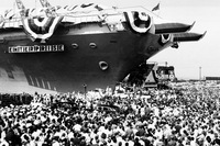A throng estimated at 15,000 gathers to watch the christening of the USS Enterprise at Newport News, Va., Sept. 24, 1960.