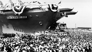 A throng estimated at 15,000 gathers to watch the christening of the USS Enterprise at Newport News, Va., Sept. 24, 1960.