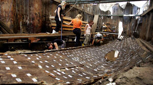 Archaeologists in Istanbul work on the remnants of a Byzantine-era ship in June 2006.