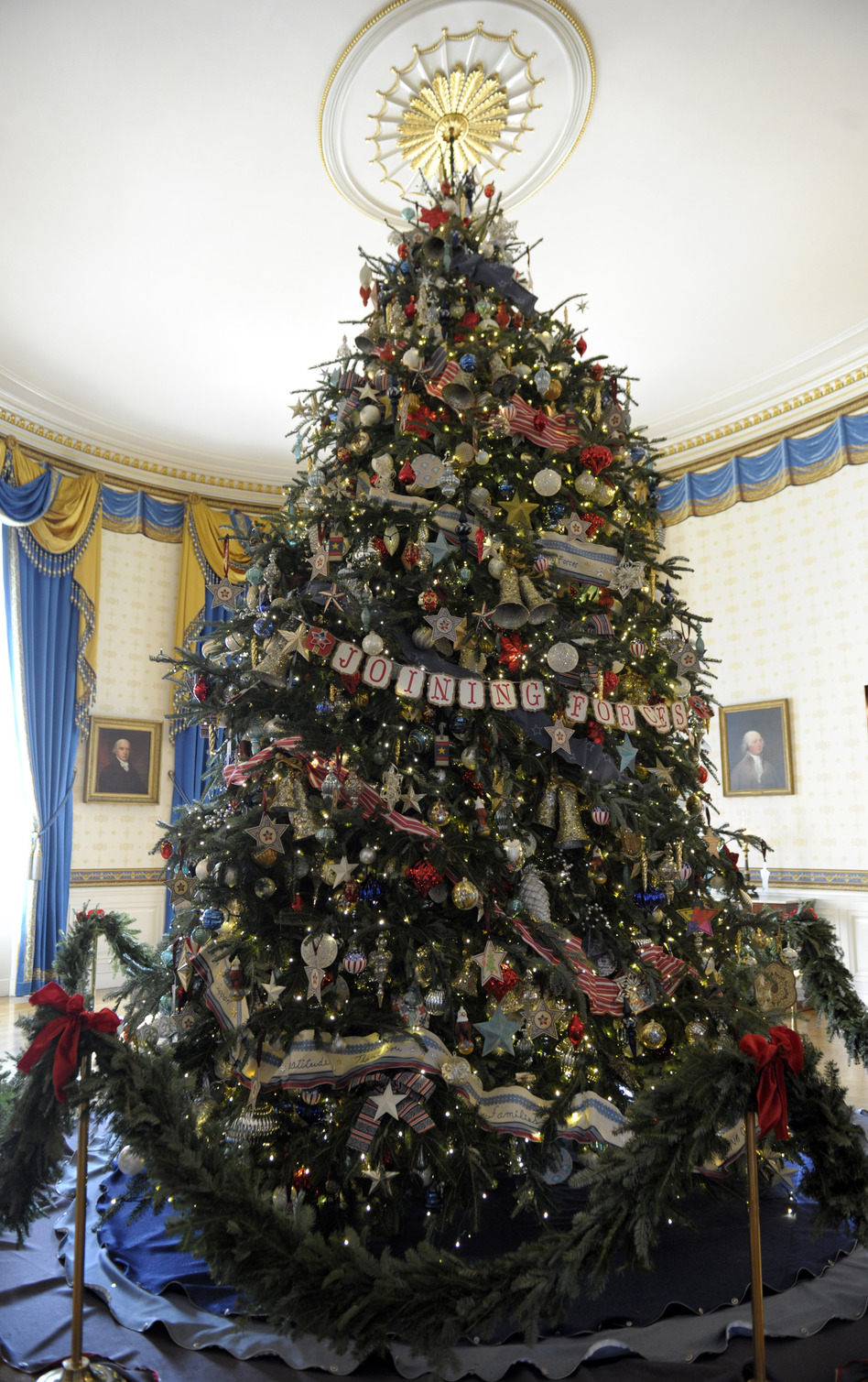 The official White House Christmas tree, an 18-foot-6-inch Frasier fur from Jefferson, N.C., was adorned with ornaments decorated by military children living on bases all over the world.