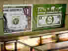 An advertisement for AmericansForGeorge.org is displayed in the Washington, D.C. metro.