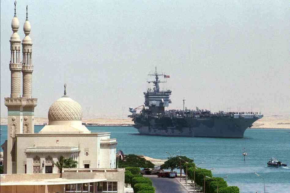The Enterprise transits the Suez Canal on Sept. 15, 1996. The aircraft carrier was en route from the Adriatic to join existing U.S. forces in the Persian Gulf for possible action against Iraqi targets.