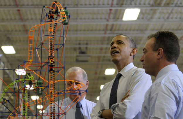 President Obama looks over a roller coaster with K'Nex inventor and Chairman Joel Glickman (left) and President and CEO Michael Araten on Friday during a tour of the company in Hatfield, Pa.