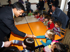 Rajiv Shah (left), the head of USAID, speaks with children during a visit at the Oncupinar Syrian refugee camp in Turkey, near the Syrian border, on Nov. 27. Rajiv Shah (left), the head of USAID, speaks with children during a visit at the Oncupinar Syrian refugee camp in Turkey, near the Syrian border, on Nov. 27.