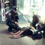 The photo that touched many hearts: New York City Police Officer Lawrence DePrimo gives a shoeless man a pair of boots on a frigid night last month. That man was later identified as 54-year-old Jeffrey Hillman.