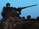 Turkish soldiers stand guard in the town of Akcakale, just across the border from Syria, on Oct. 4. The Turks have often issued stern warnings and retaliated when shooting from the Syrian war has come across their border. But Turkey did not respond to an incident over the weekend. Turkish soldiers stand guard in the town of Akcakale, just across the border from Syria, on Oct. 4. The Turks have often issued stern warnings and retaliated when shooting from the Syrian war has come across their border. But Turkey did not respond to an incident over the weekend.