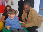 LeVar Burton and 7 year old Shane Ammon exploring the all Reading Rainbow adventure app at the "Reading Rainbow Relaunch" event in June. LeVar Burton and 7 year old Shane Ammon exploring the all Reading Rainbow adventure app at the "Reading Rainbow Relaunch" event in June.