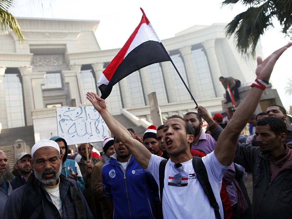 Hundreds of supporters of Egypt's president Mohammed Morsi protested outside a top Egyptian court Sunday in Cairo.