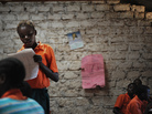 A schoolgirl participates in a lesson in Kilifi, about 30 miles northeast of Mombasa on Kenya's Swahili Coast, in 2010. A schoolgirl participates in a lesson in Kilifi, about 30 miles northeast of Mombasa on Kenya's Swahili Coast, in 2010.