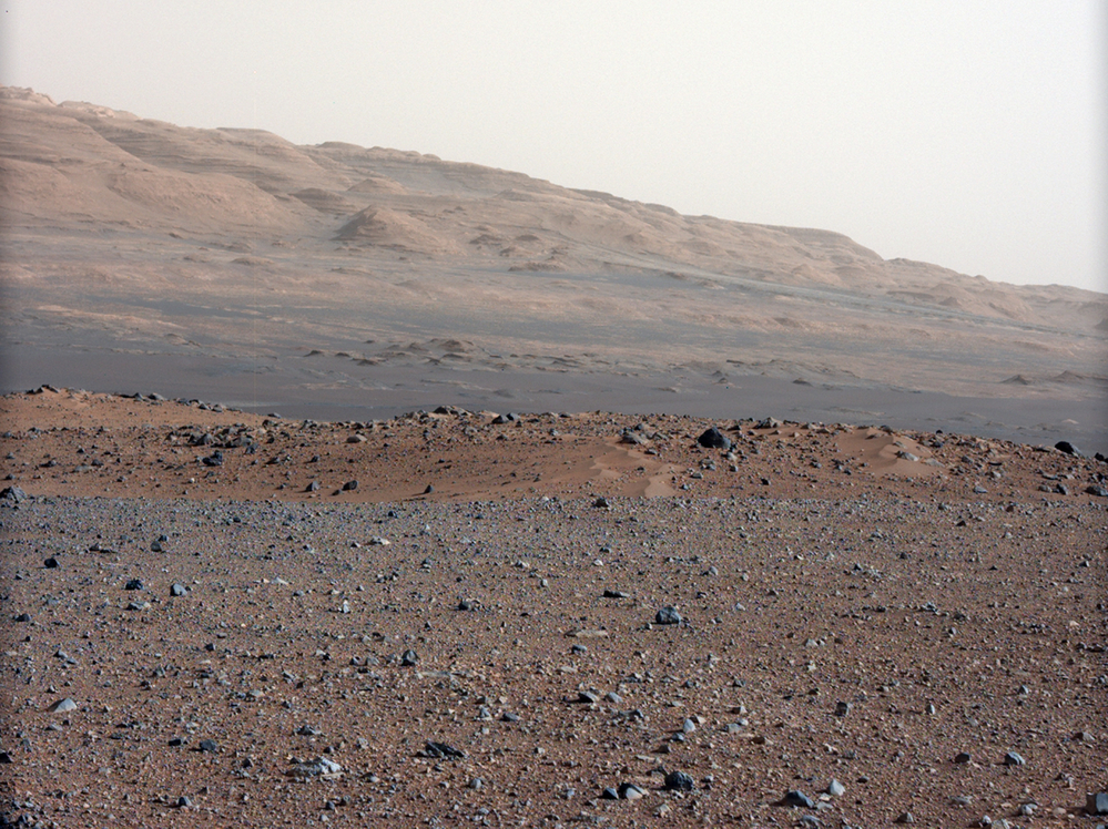 This photo, taken by NASA's Curiosity rover, shows Mars' Gale Crater, where the rover has taken samples for chemical analysis. Scientists believe that at some point in the very distant past, there was a riverbed here.